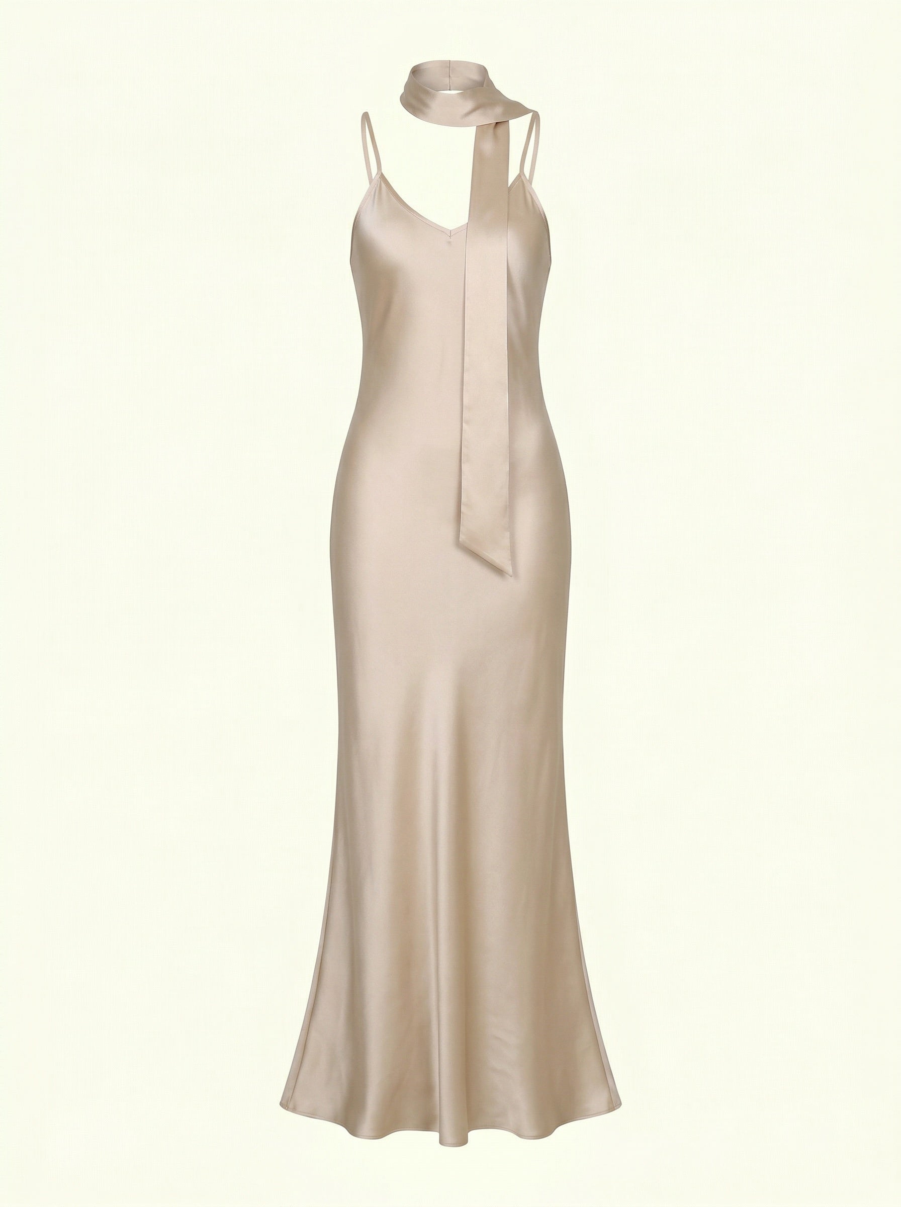 Beige evening gown with thin straps on a white background