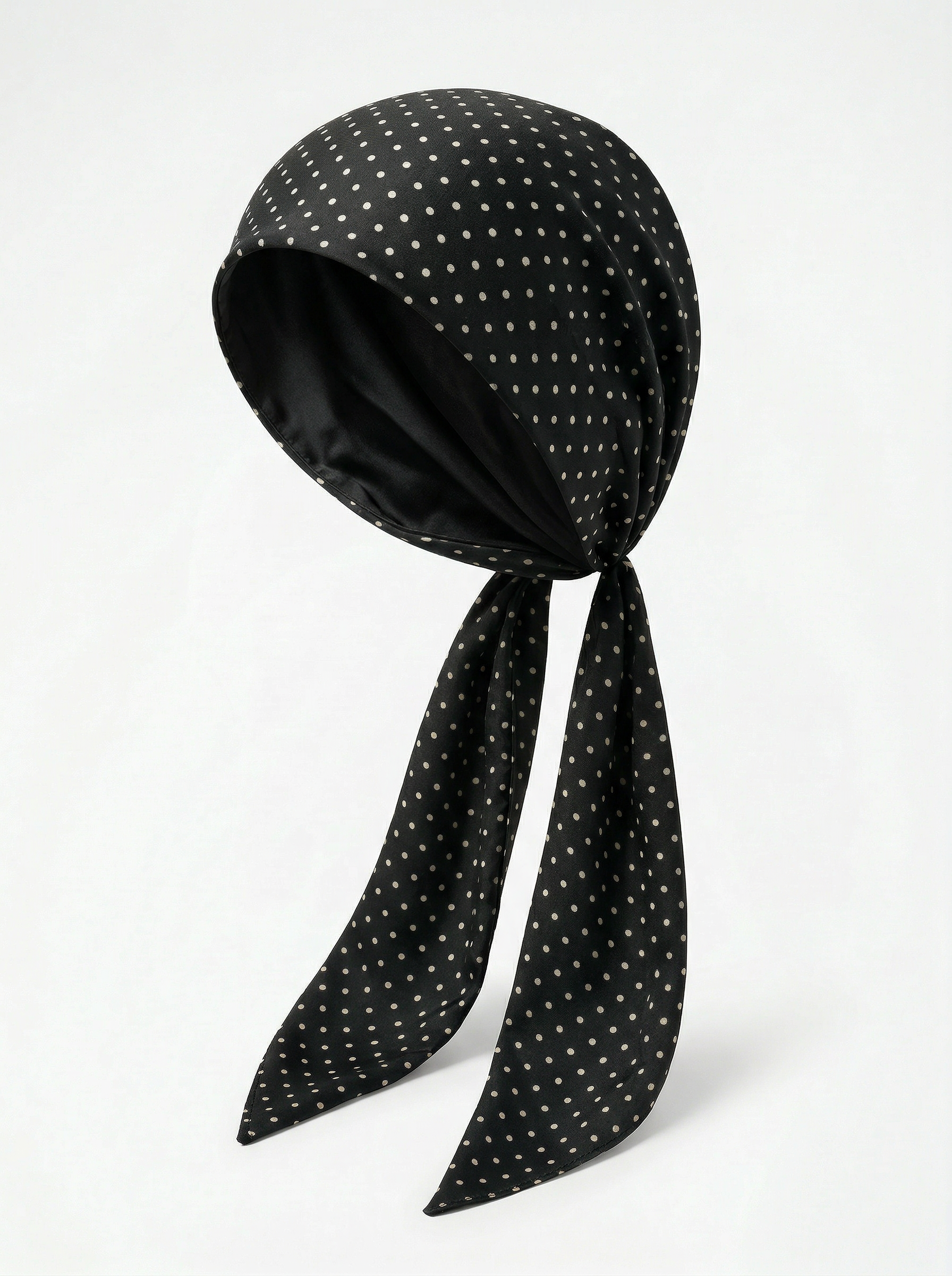 Black headscarf with white polka dots on a white background